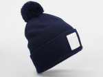 Bonnet avec pompon et patch