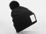 Bonnet avec pompon et patch